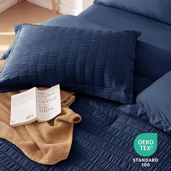 MUXHOMO 7 Pieces California King Comforter Set, Seersucker Bed in a Bag Cal King Size, All Season Luxury Bedding Set with Comforter, Flat Sheet, Fitted Sheet, Pillowcases & Shams, Navy Blue