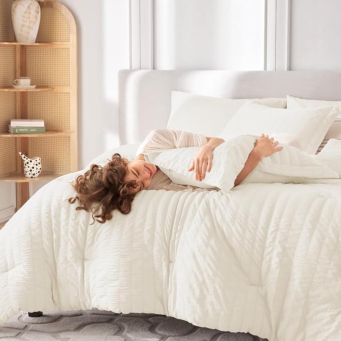 MUXHOMO 7 Pieces California King Comforter Set, Seersucker Bed in a Bag Cal King Size, All Season Luxury Bedding Set with Comforter, Flat Sheet, Fitted Sheet, Pillowcases & Shams, Ivory