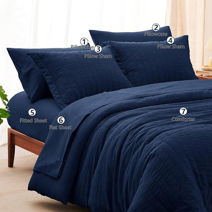 CozyLux Oversized Queen Comforter Set Navy Blue Seersucker 7 Pieces Bed in a Bag Queen Comforter Set with Sheets, Luxury Soft Bedding Set with Down Alternative Comforter, Sheets, Pillowcases & Shams