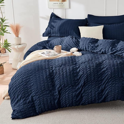 HYMOKEGE Navy Blue Oversized King Comforter Set Seersucker 7 Pieces, All Season Luxury Bed in a Bag for Bedroom, Bedding Set with Comforter, Sheets, Pillowcases & Shams