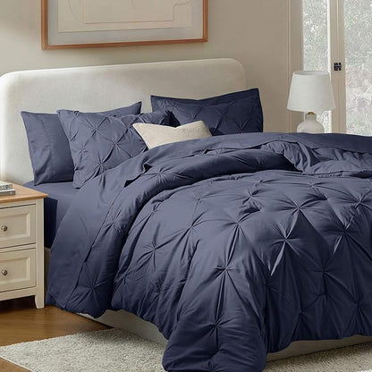 Nestl 7 Piece Comforter Set - Pinch Pleated Bedding, All Season Full Size Bed Set with Sheets, Comforter, Pillowcases and Shams in Navy