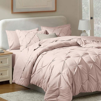 Nestl Queen Comforter Set 7 Piece - Pinch Pleated Comforters Queen Size Blush Pink, Bed in a Bag Queen All Season, Queen Size Comforter Set Bedding with Flat Sheet, Fitted Sheet, Pillowcases and Shams