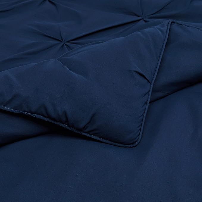 Amazon Basics All-Season Down-Alternative 3-Piece Comforter Bedding Set, Soft Lightweight Microfiber, Pinch Pleat Design, Full/Queen, Navy Blue