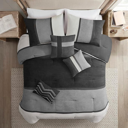 Madison Park Palisades Comforter Set Modern Faux Suede Pieced Stripe Design, All Season Down Alternative Cozy Bedding with Matching Shams, Decorative Pillows, King(104"x92"), Black 7 Piece