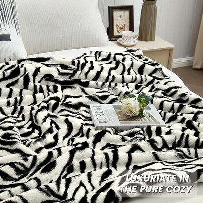 JONIYEAR Soft Fluffy Zebra Print Faux Rabbit Fur Throw Blanket 50" x 60", Luxury Cozy Shaggy Fuzzy Blankets, Reversible Cute Warm Animal Printed Blanket for Women Winter,Washable,Cream White and Black